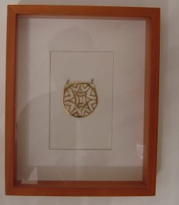 My first piece of jewelry ever My first piece of jewelry ever! Made from a worn out brass fitting, This is now plated in gold and hanging in my library.